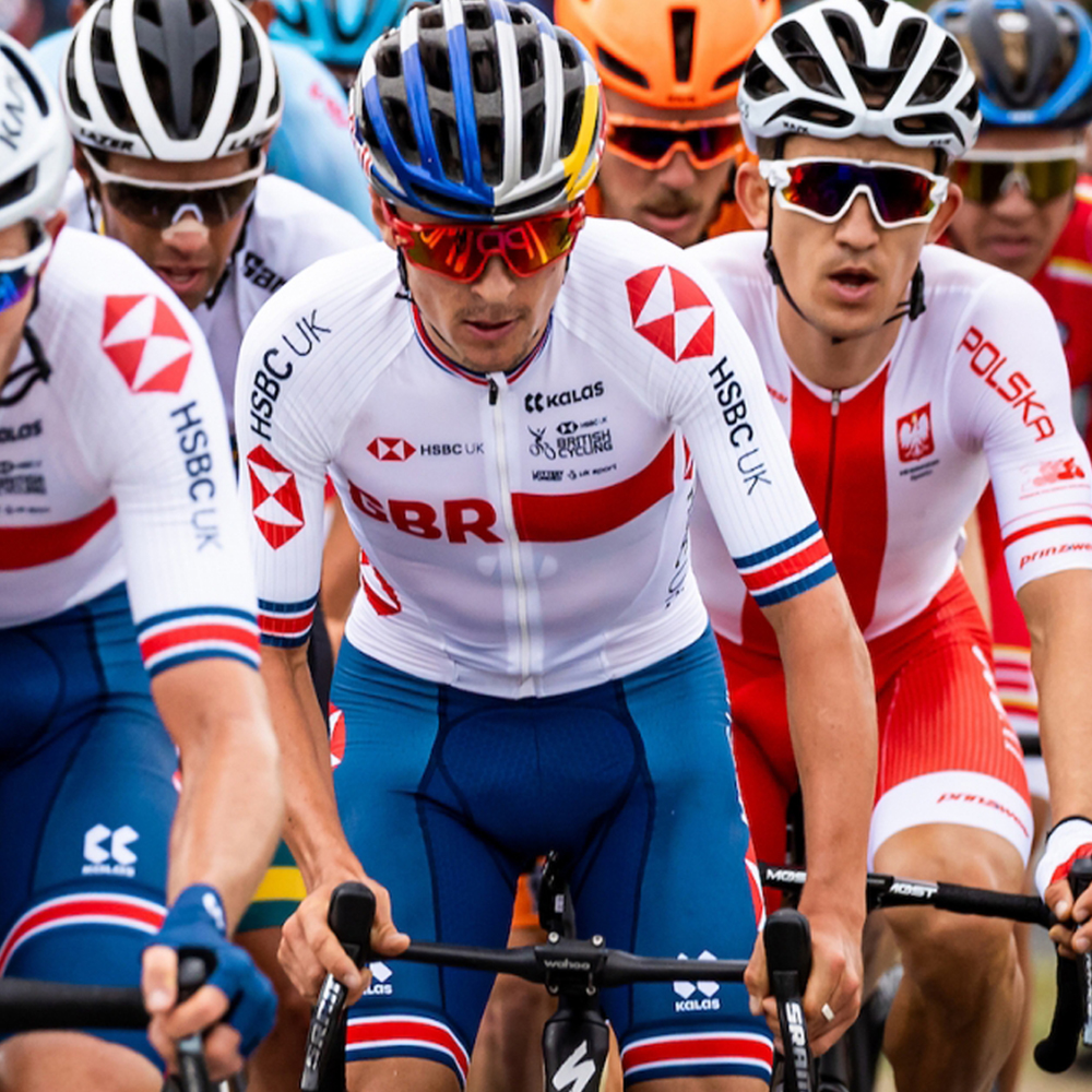 A group of cyclists riding in a race.